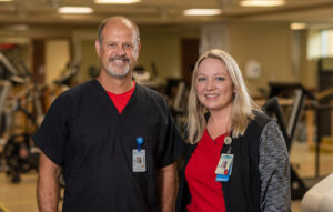Cardiac Rehab staff members Elvis Stewart and Leslie Cunningham.