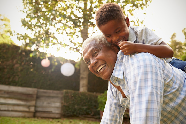 Father and Son Playing in Yard