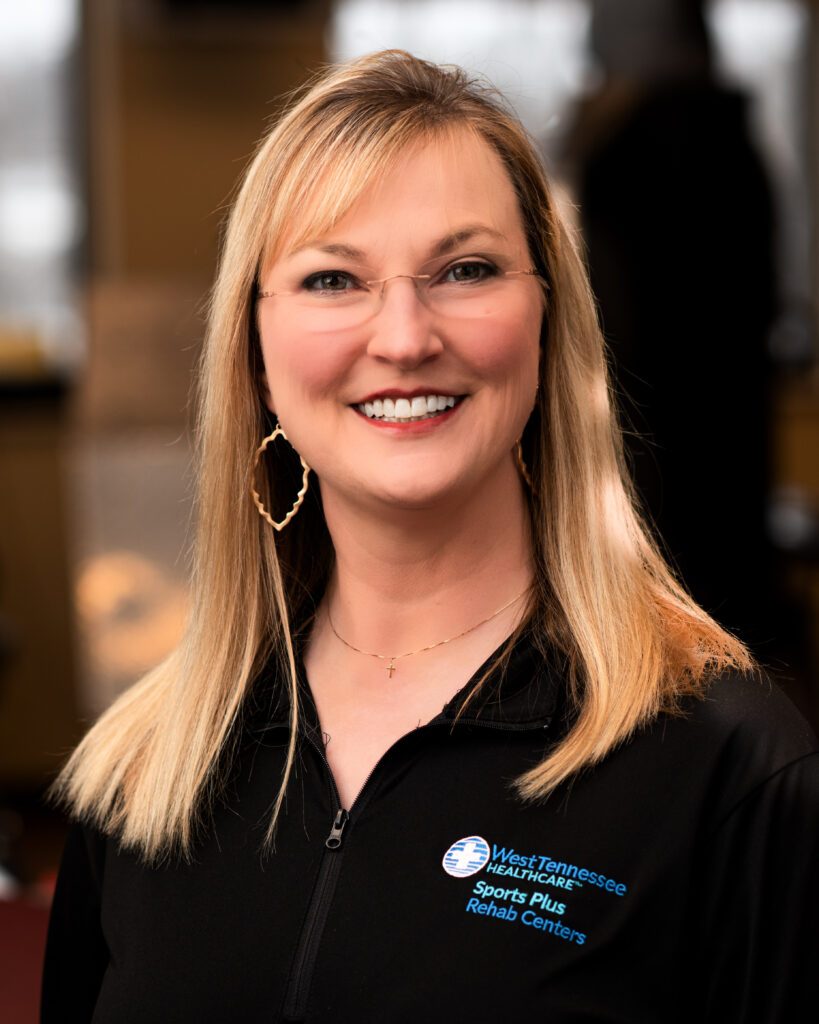 Environmental portrait of Sports Plus Humboldt employee Kelly Smith.