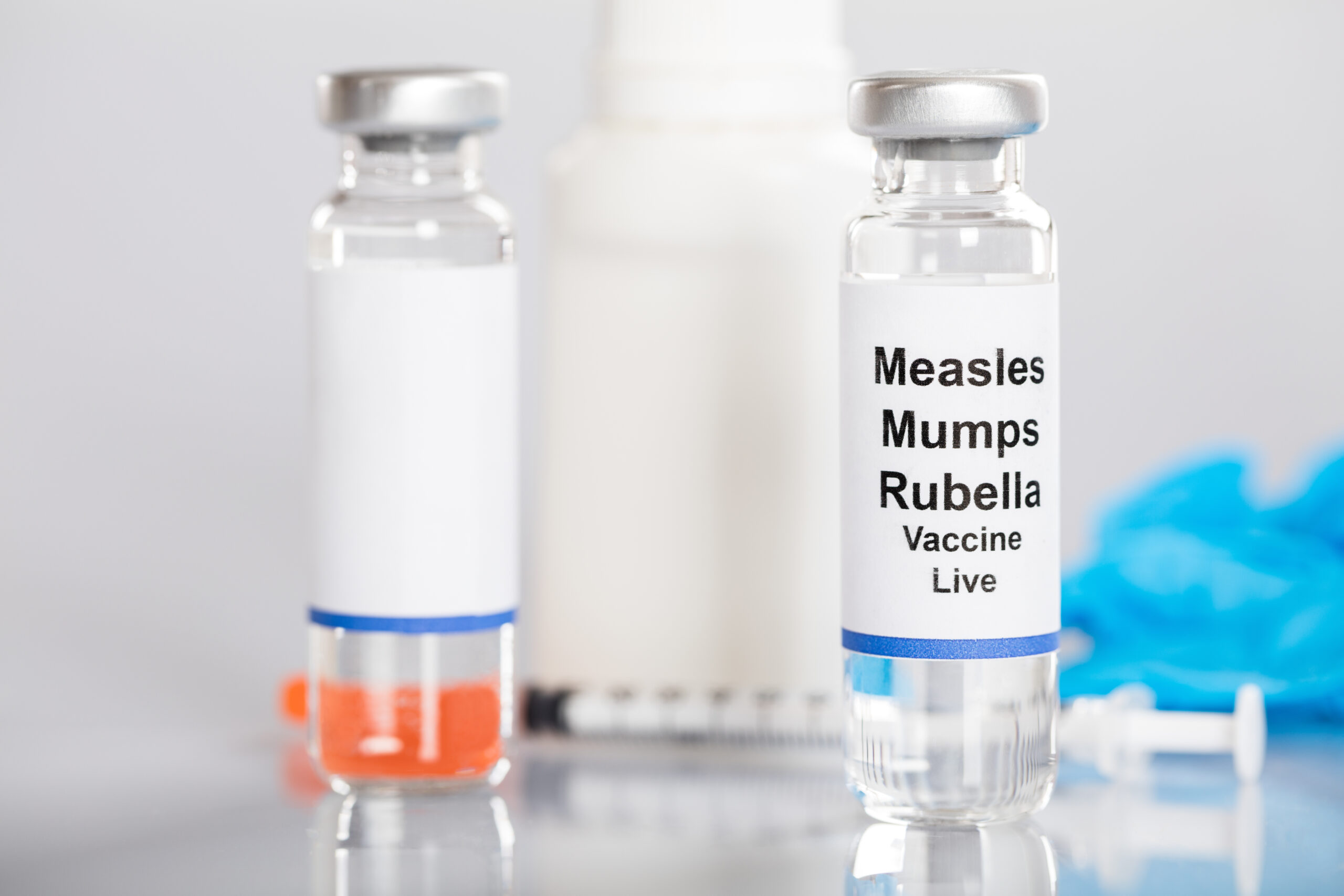 measles vaccine and syringe