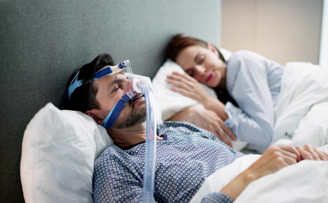 Man with CPAP sleeping