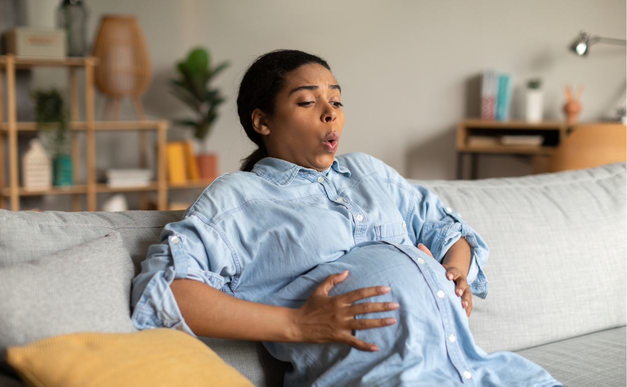Pregnant woman showing signs of labor
