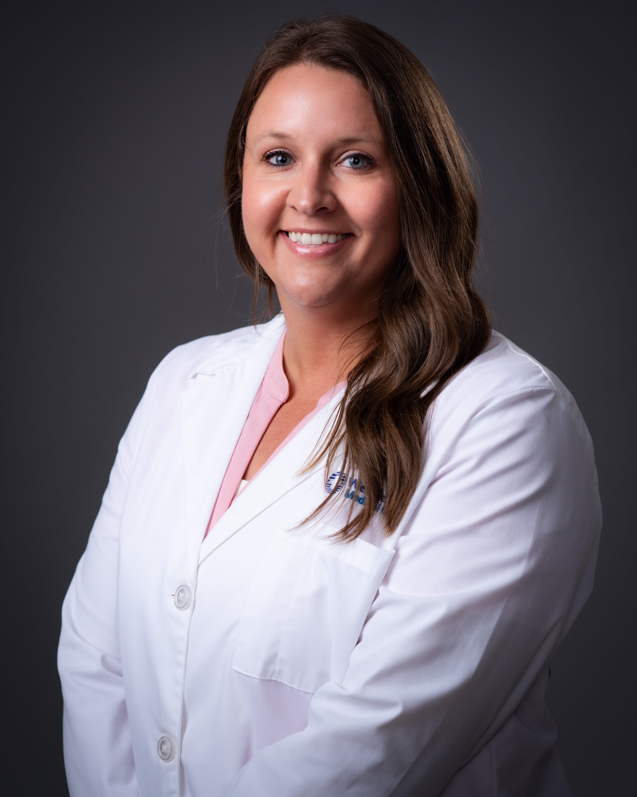 Studio portrait of Cassie Halliburton NP, a provider with WTMG.