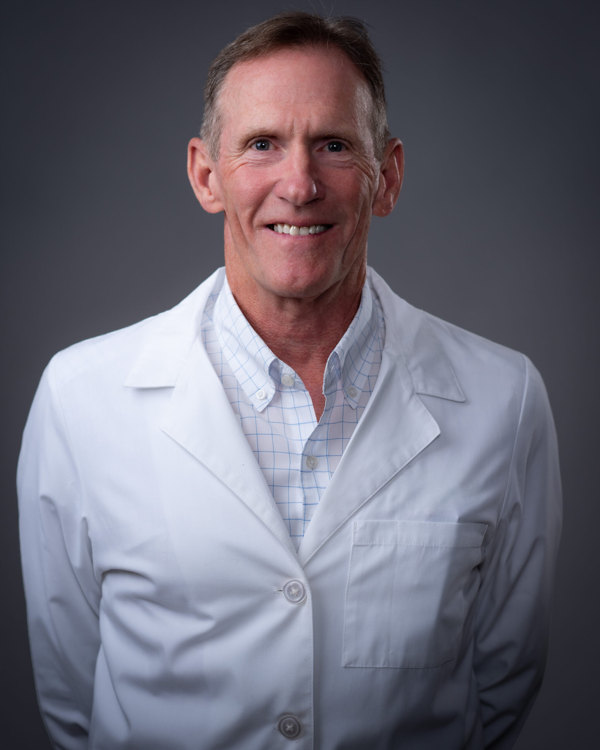 Mark D. Flora, MD, board-certified urologist in Jackson, Tennessee.